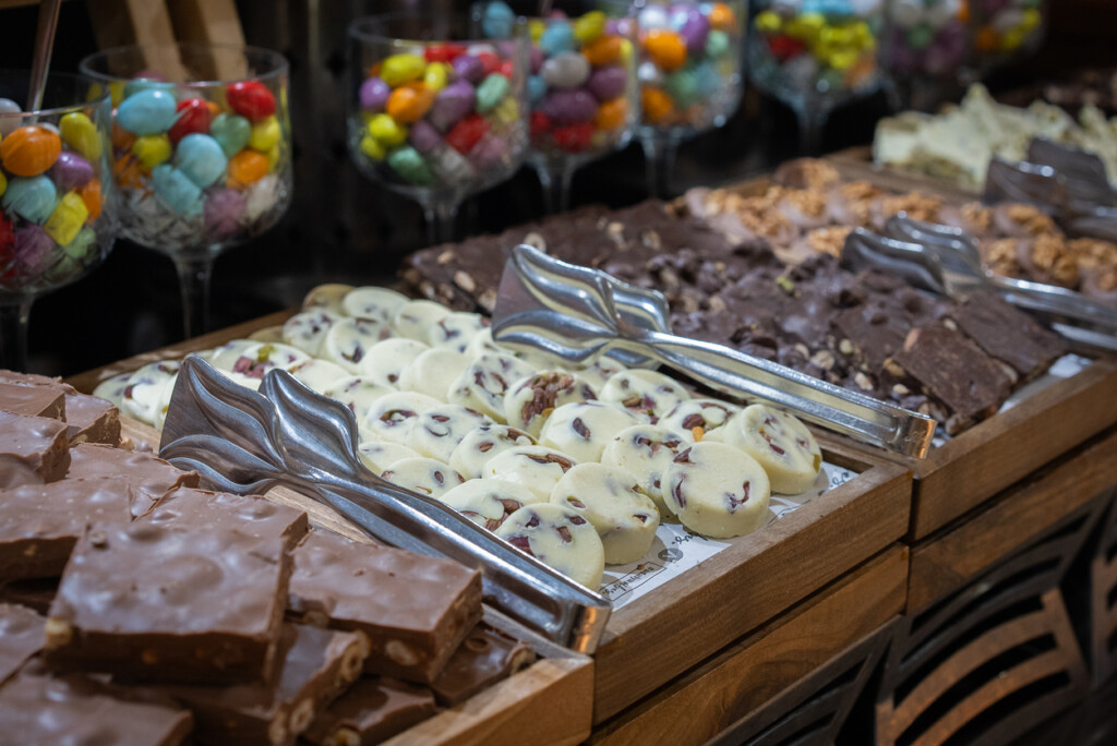 Chocolate and colored candy arrangement displayed after shipping candy to the store.